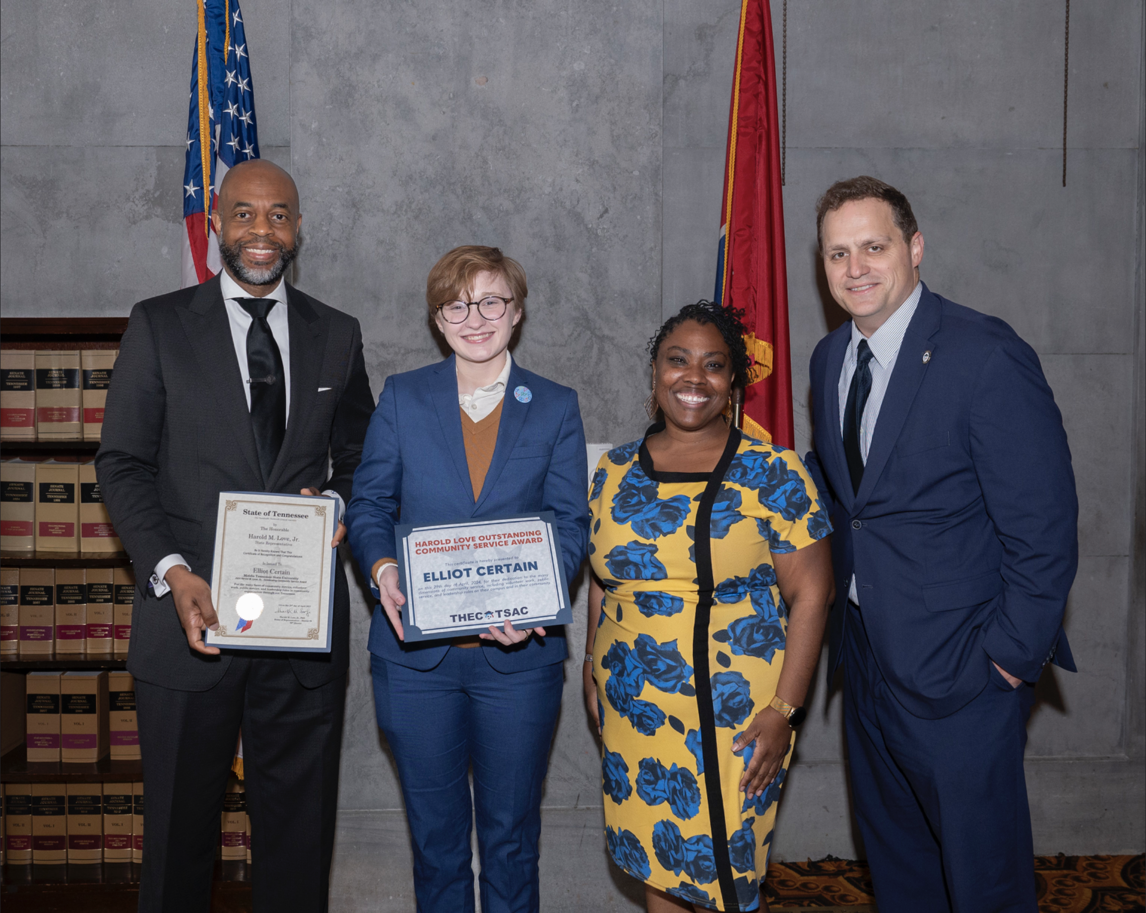 Senior social work major Elliot Certain, second from left, receives his 2024 Harold Love Outstanding Community Service Award April 29 at the Tennessee Capitol in Nashville, Tenn. Presenting the award are, from left, state Rep. Harold Love Jr. of Nashville, Tennessee Higher Education Commission Director of HBCU Success Brittany Mosby and THEC Executive Director Steven Gentile. 